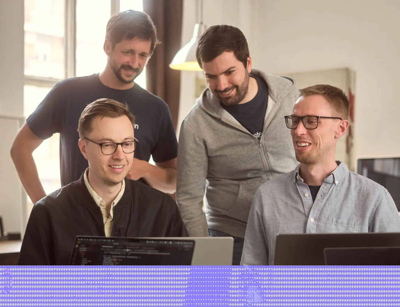 HostedScan engineers working together in the office